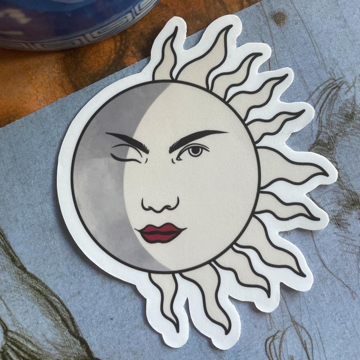 Crescent Moon & Winking Sun Sticker
